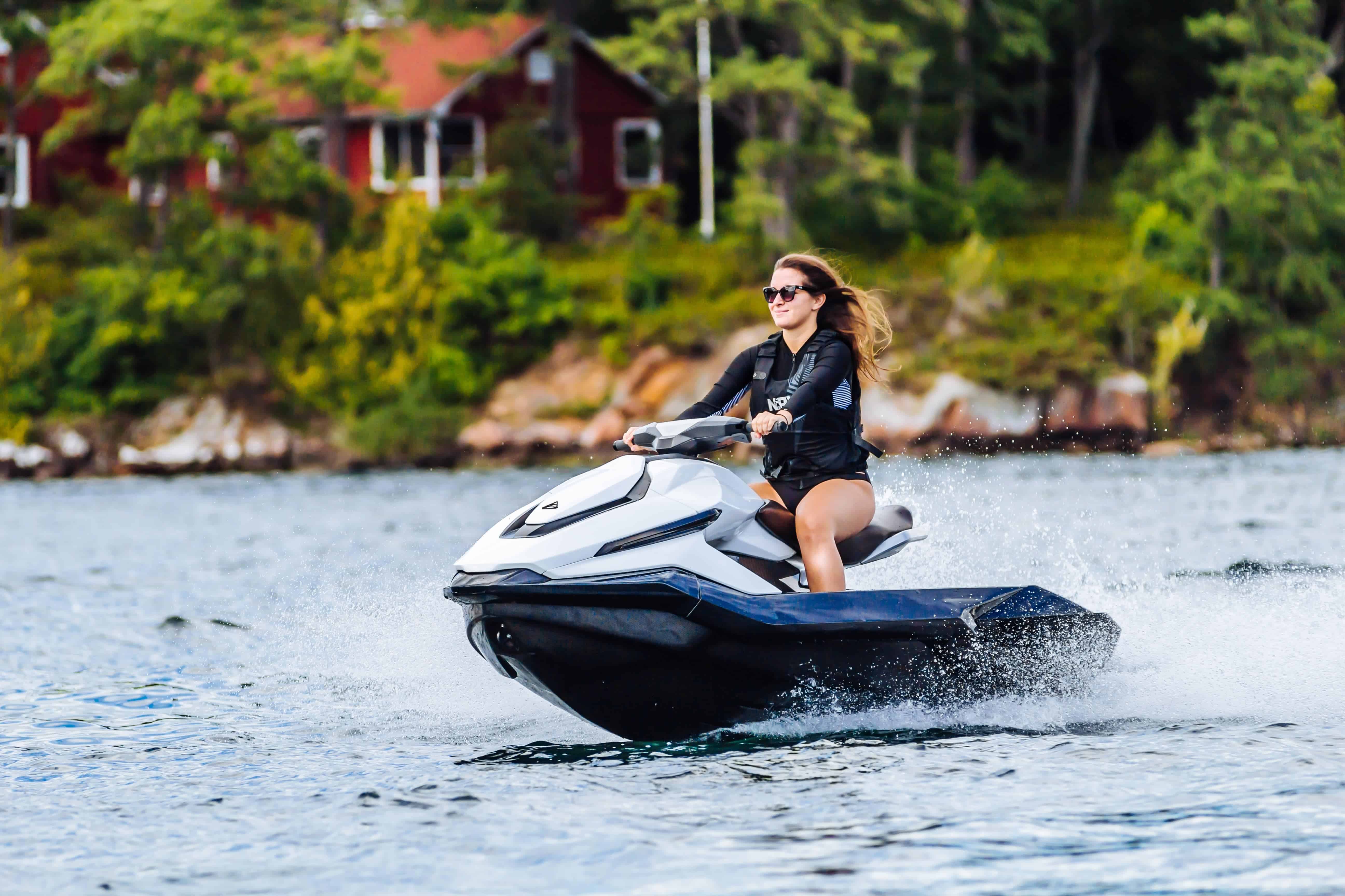 Woman riding jet ski