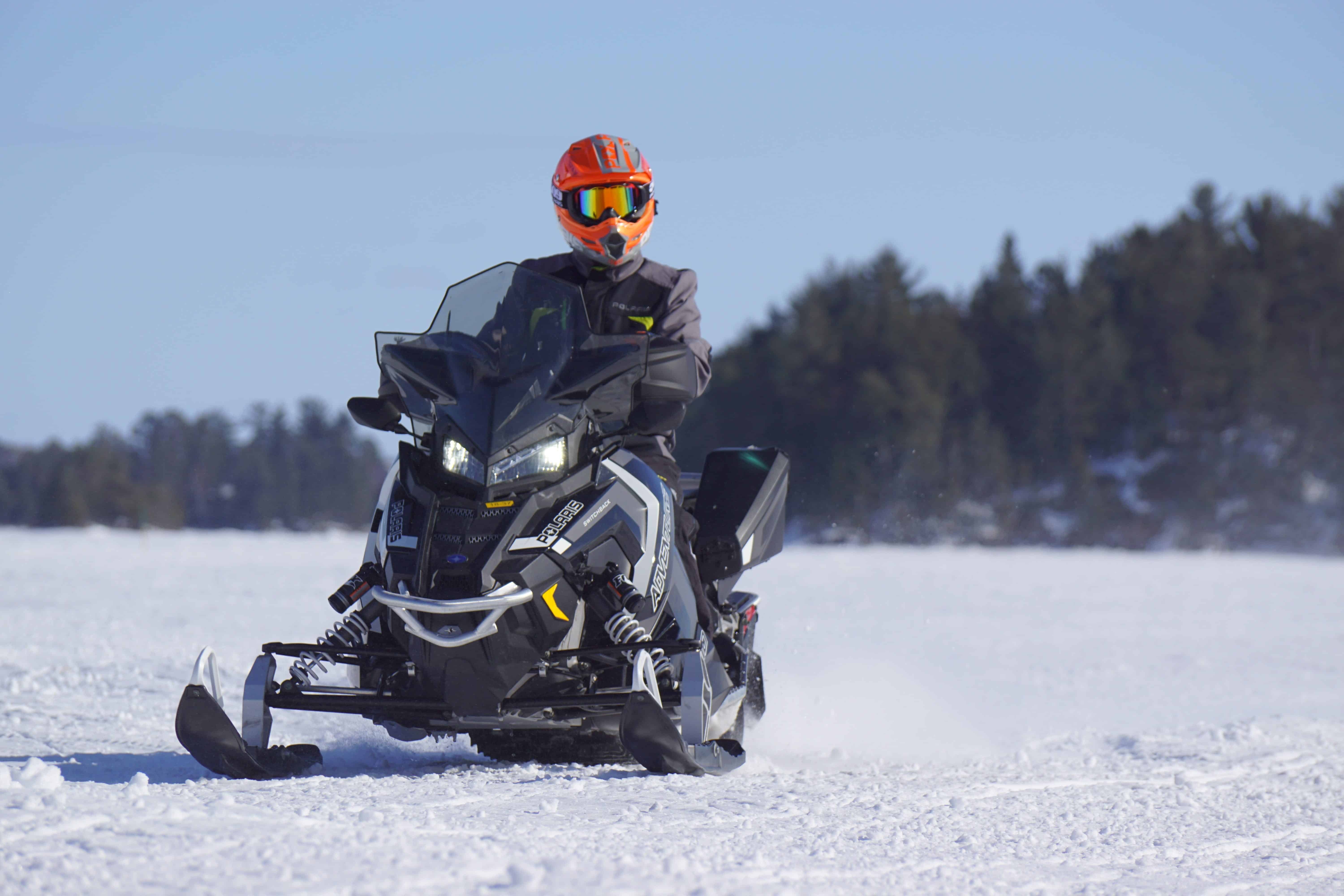 Man riding a snowmobile