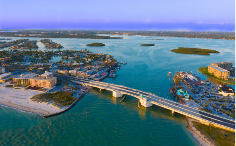 Aerial View of Johns Pass Village and Boardwalk at Madeira Beach, Florida.