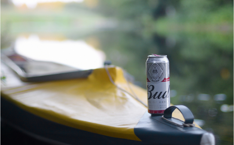 Budweiser Bud beer can on yellow kayak.