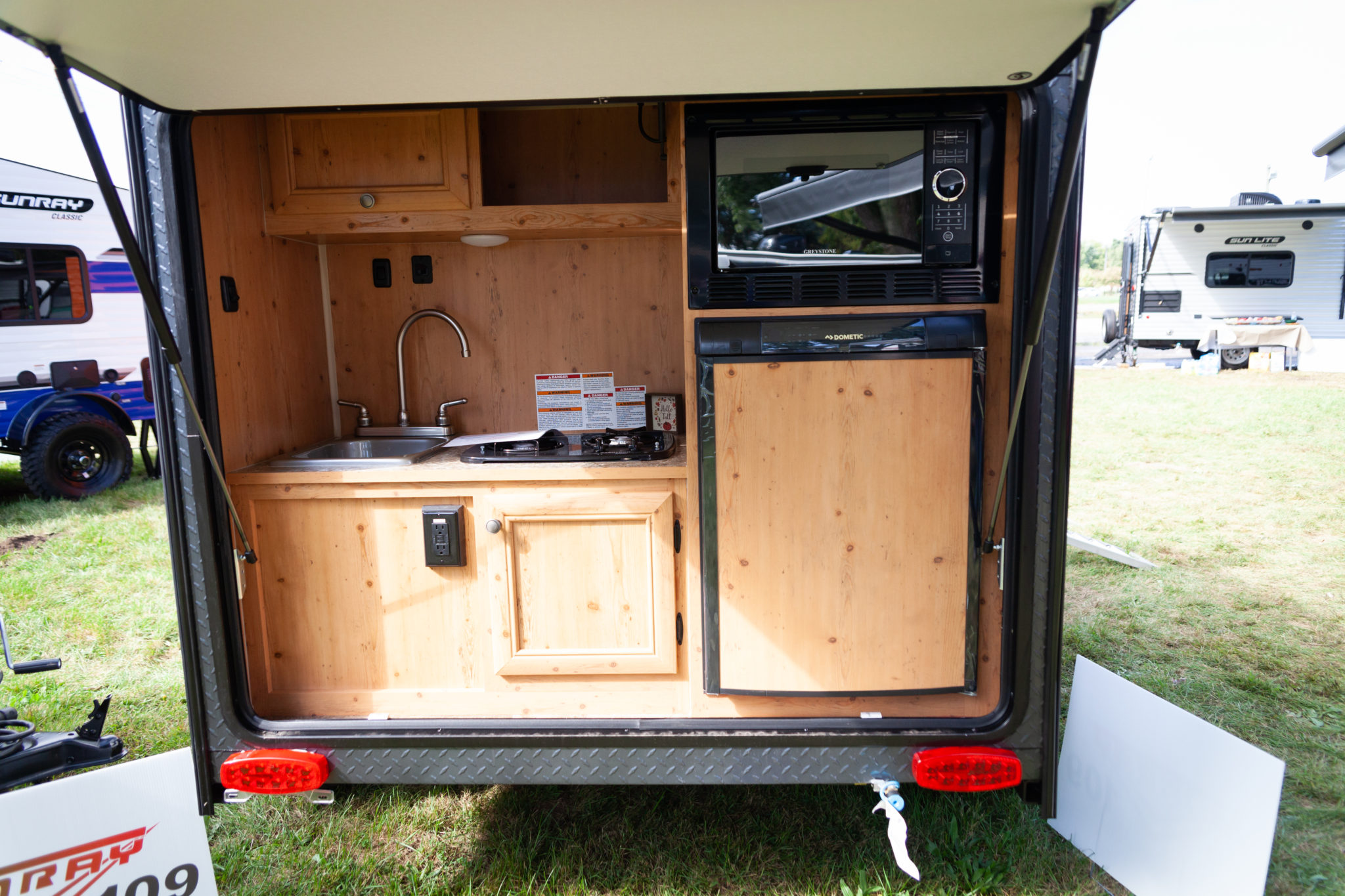 small travel trailer with outdoor kitchen