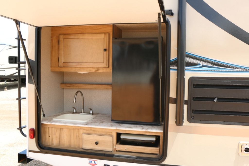 light travel trailer with outdoor kitchen