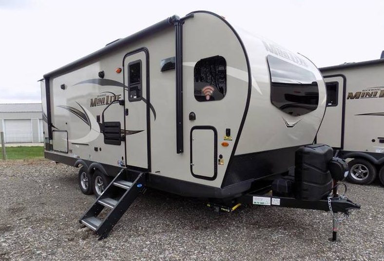 small travel trailer with outdoor kitchen