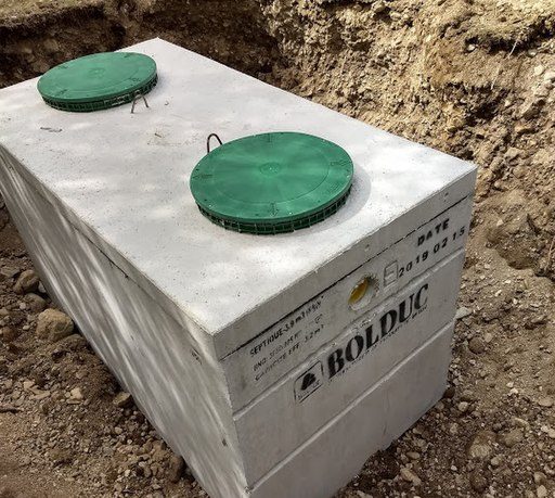 Concrete septic tank.