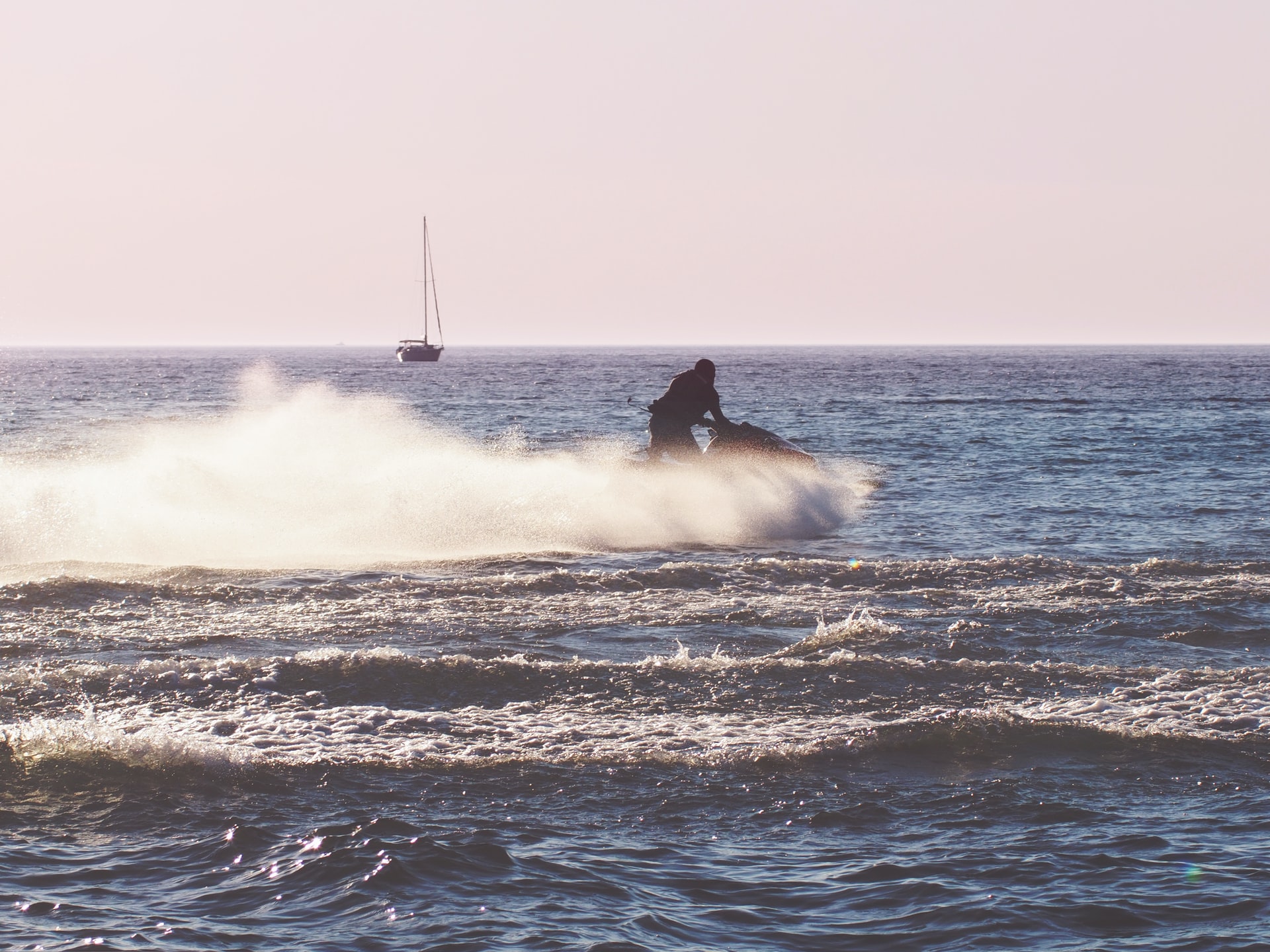 A Motorboat is Crossing Paths with a PWC. What Action Should be Taken?